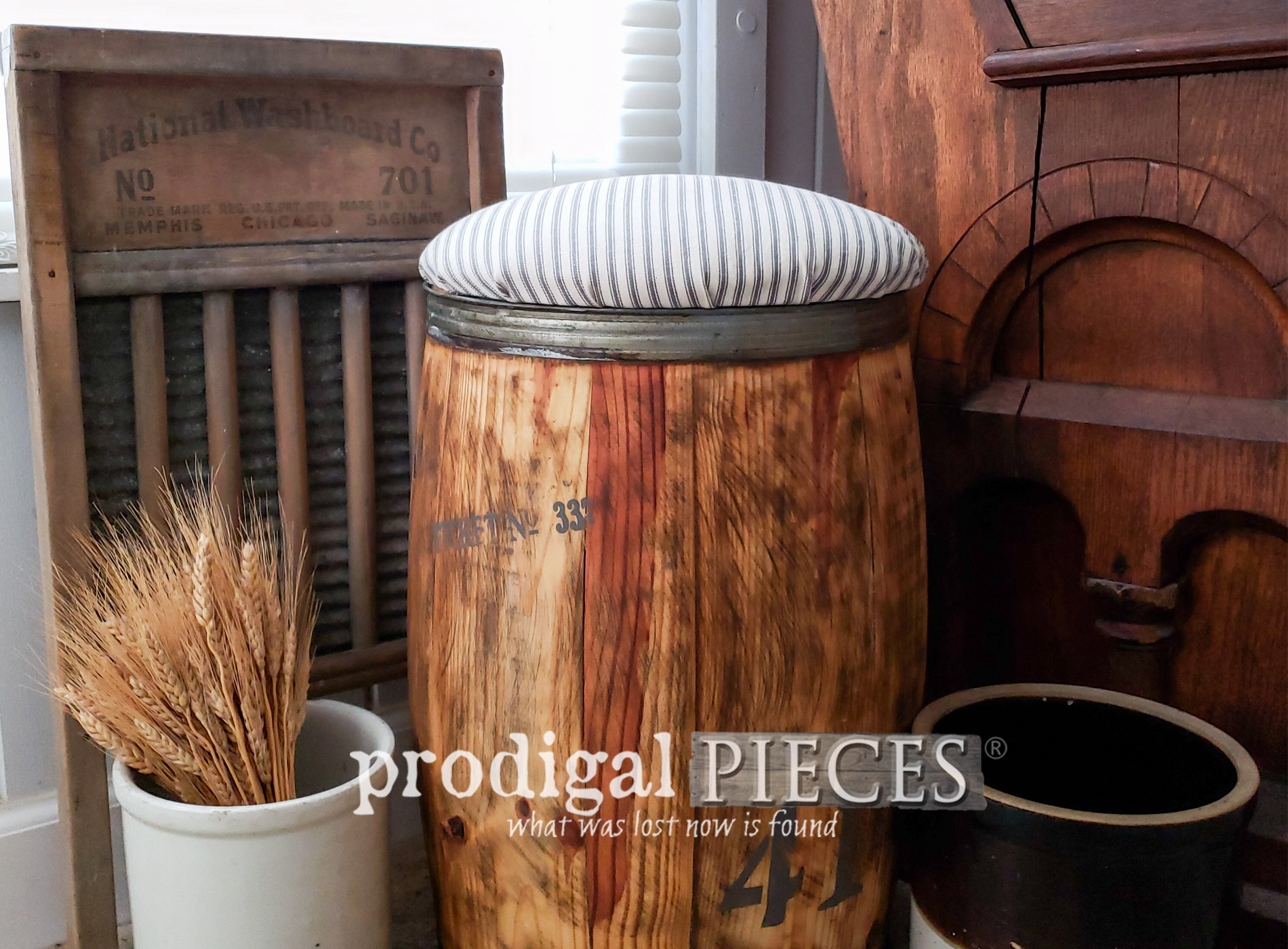 Featured Rustic Farmhouse Nail Barrel Stool with Gray Ticking Stripe Upholstery by Larissa of Prodigal Pieces | prodigalpieces.com