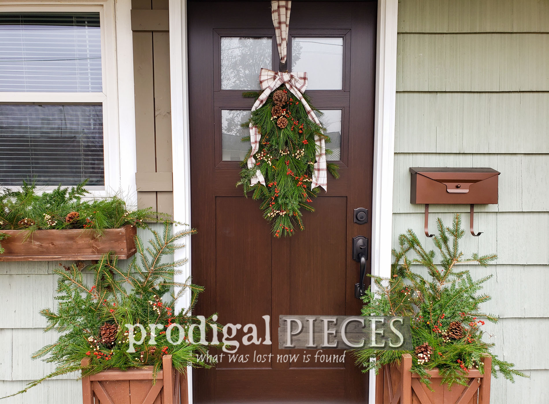 You can create this affordable DIY Christmas Swag and Planters from foraged greens | Easy, low-cost, & fun! Come see the video tutorial by Larissa at Prodigal Pieces | prodigalpieces.com #prodigalpieces #diy #home #holiday #christmas #homedecor #farmhouse #budgetfriendly