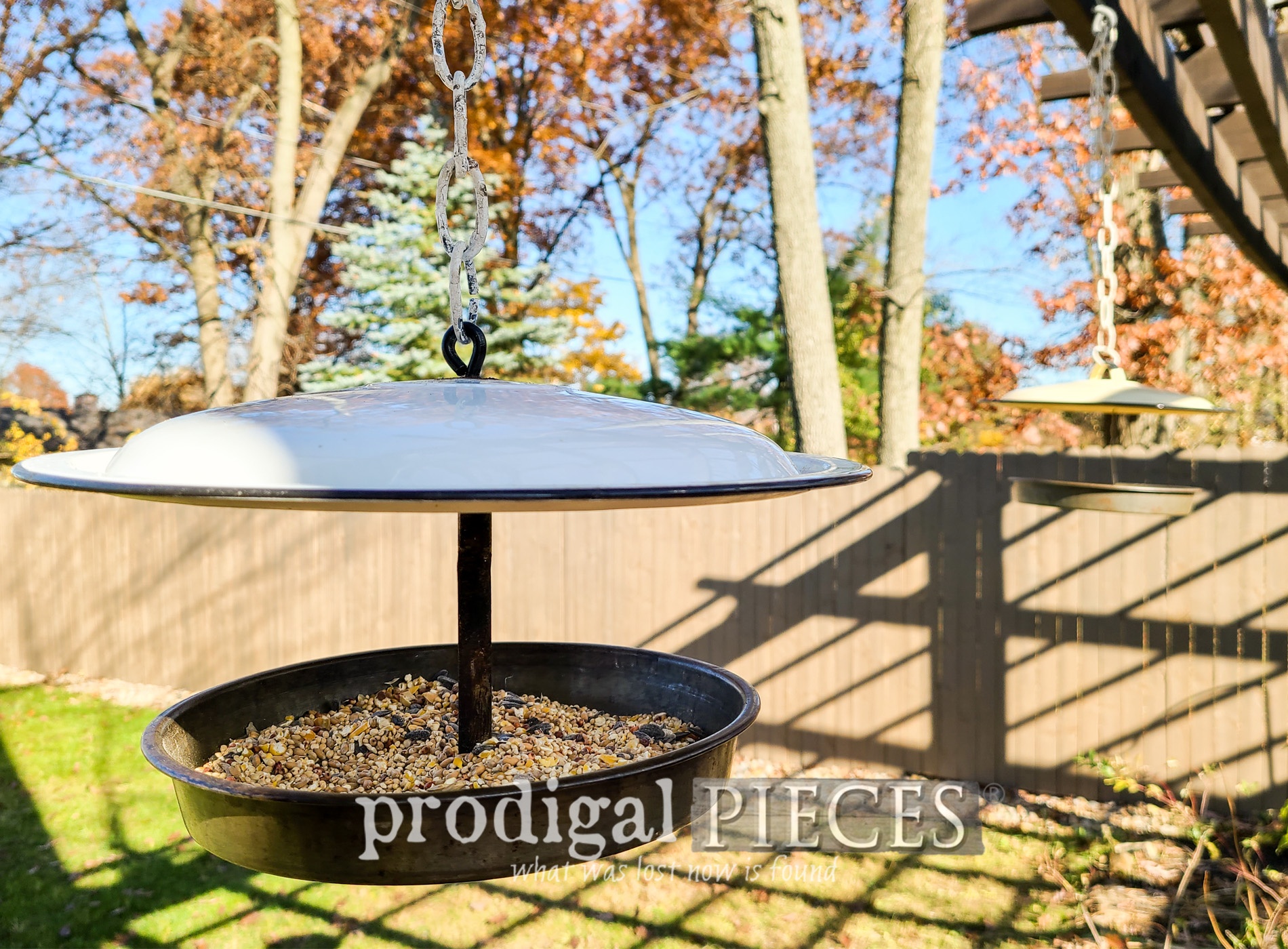 Featured Upcycled Bird Feeder from Enamel Pot Lids by Larissa of Prodigal Pieces | prodigalpieces.com #prodigalpieces #nature #birdfeeder #upcycle #gardening